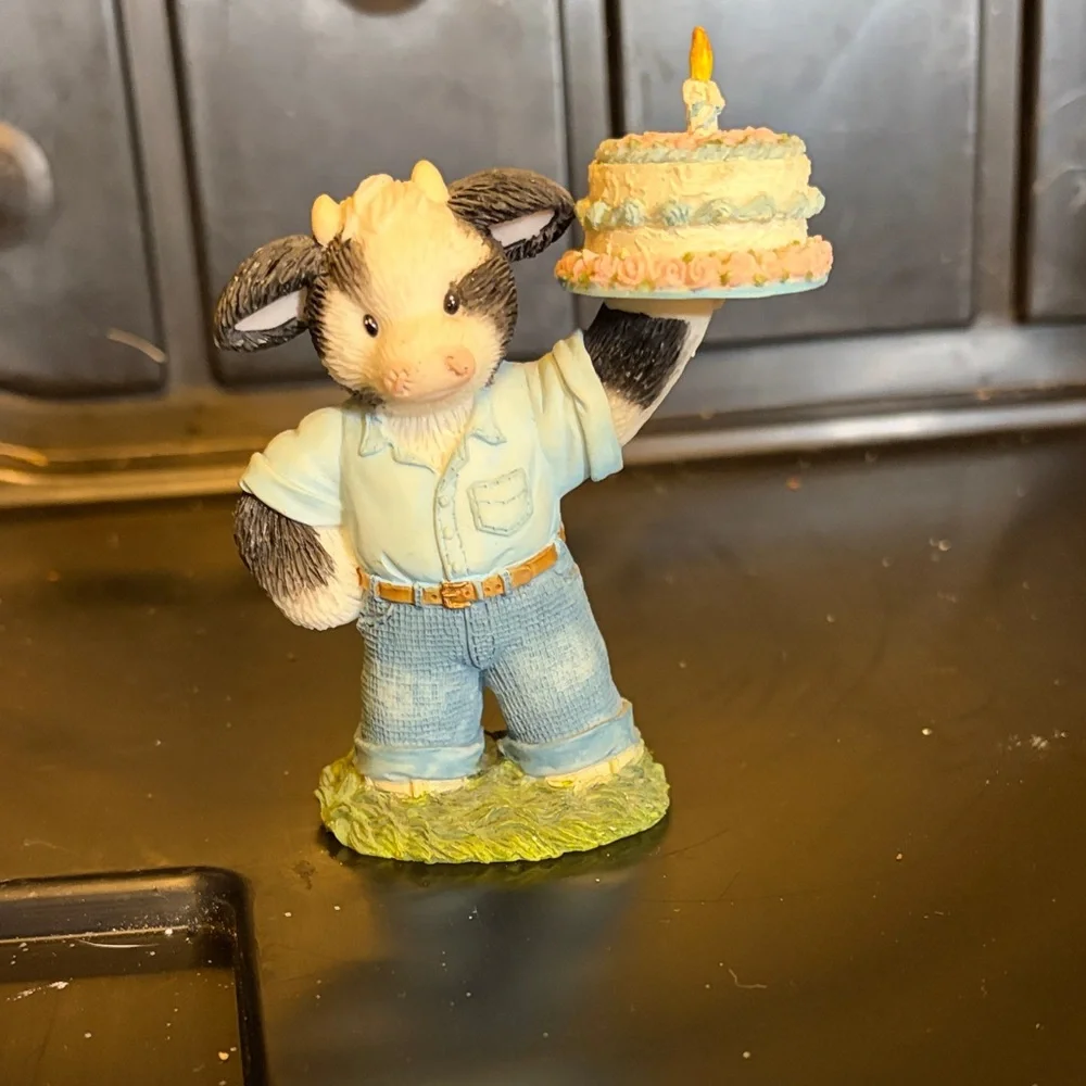 Adorable Cow Holding Cake - Blue and White
